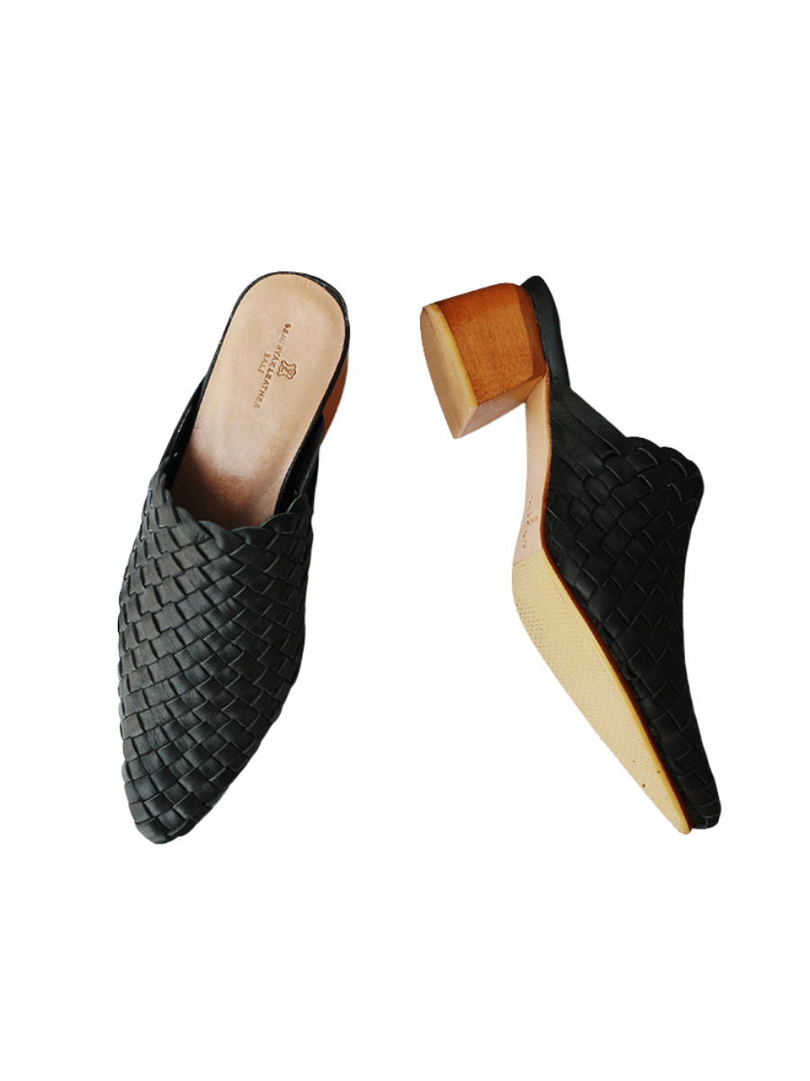 Black pointy woven heels with diagonal cut heels. Woven leather upper for a custom fit. 5 cm height. A blend of modern elegance and artisanal craftsmanship.
