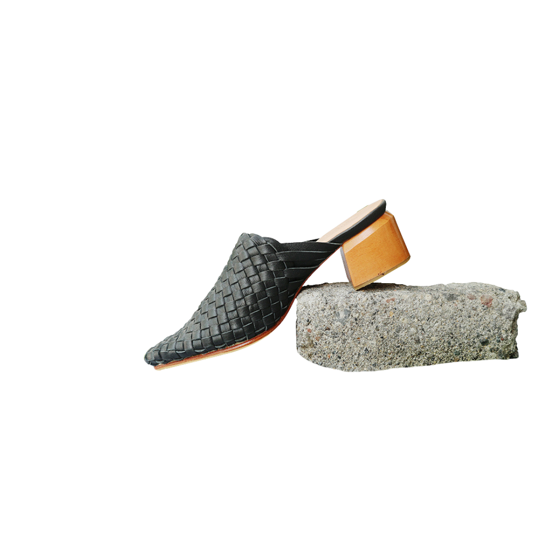 Pair of black woven mule heels designs by Seminyak Leather Bali 