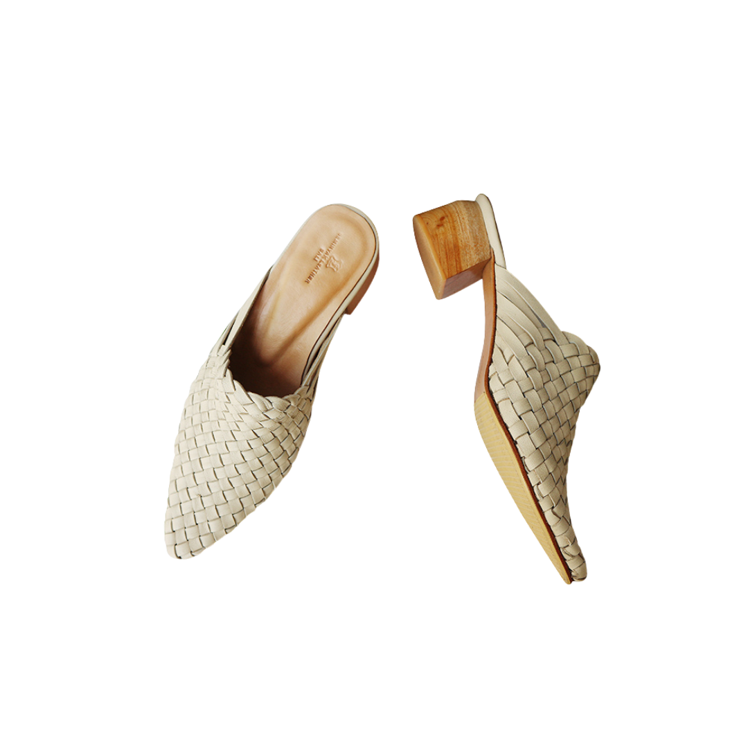 Pair of ivory woven mule heels designs by Seminyak Leather Bali 