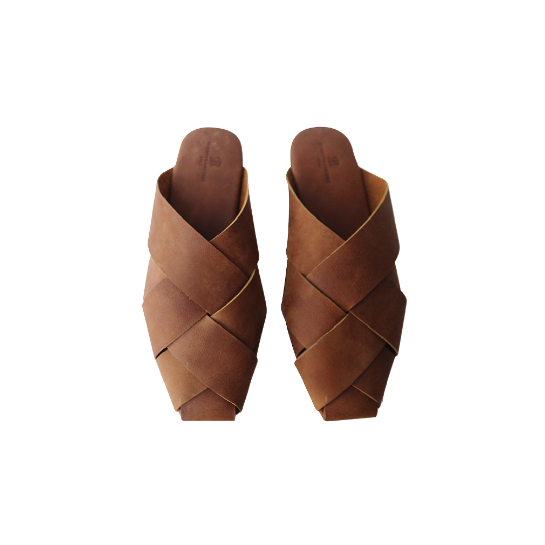 A pair of antique brown square toe mules  displayed against a white background designs by Seminyak Leather Bali