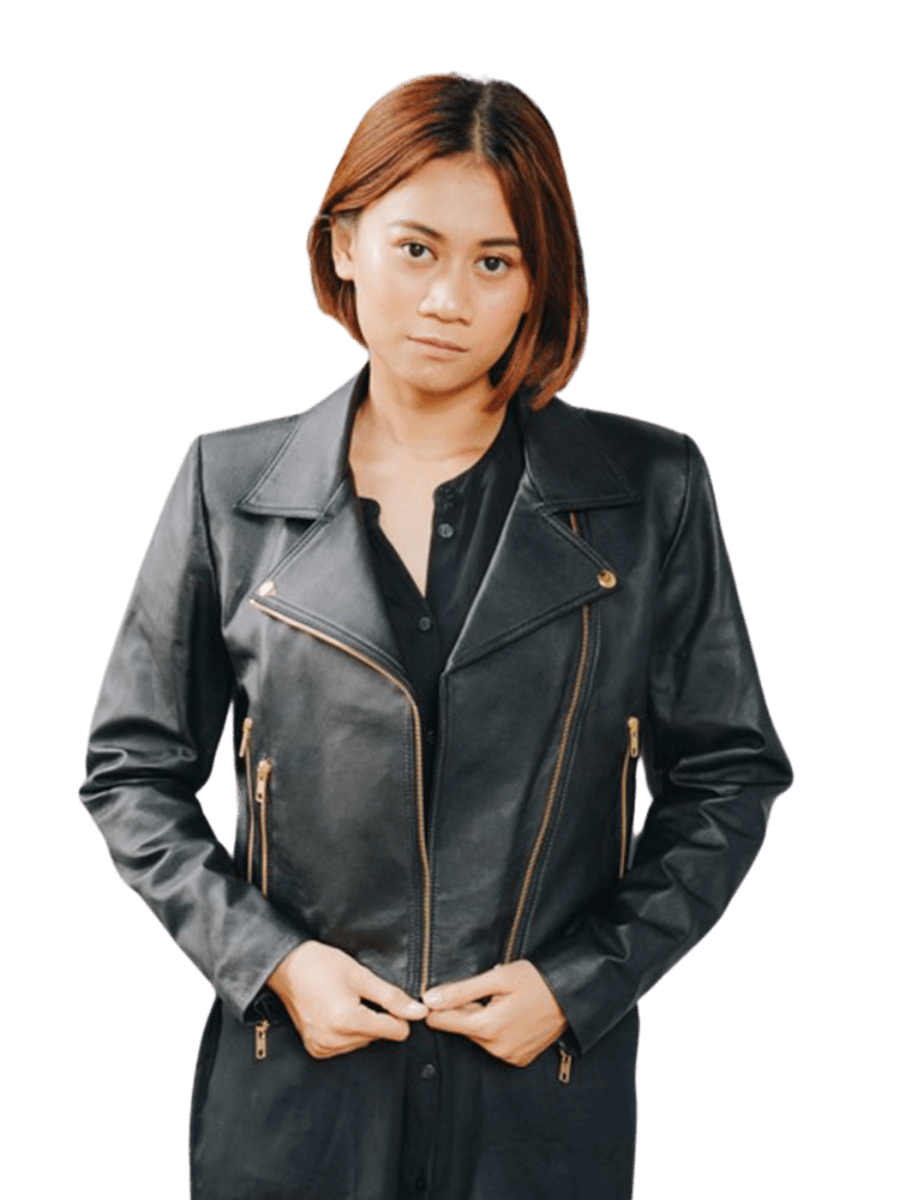 A model wearing a leather Jacket from Seminyak Leather Bali. A black leather jacket with a gold accessories and two zip pocket in each side with a detail biker on the neck. We proudly present Eliz biker leather jacket for you. 