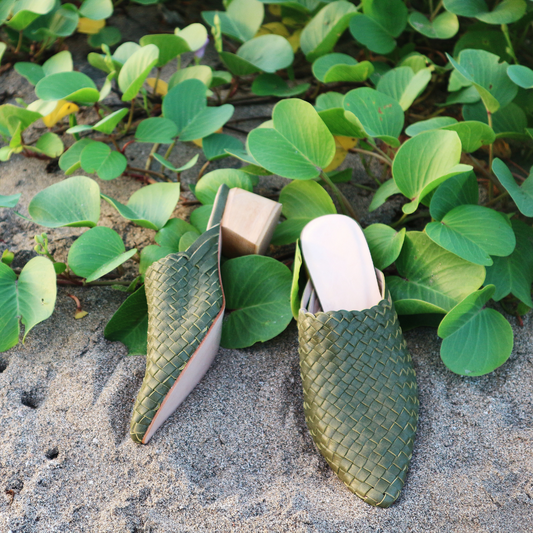 Olive green pointy woven heels with diagonal cut heels. Woven leather upper for a custom fit. 5 cm height. A blend of modern elegance and artisanal craftsmanship.